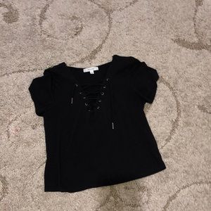Women’s black shirt with lace up